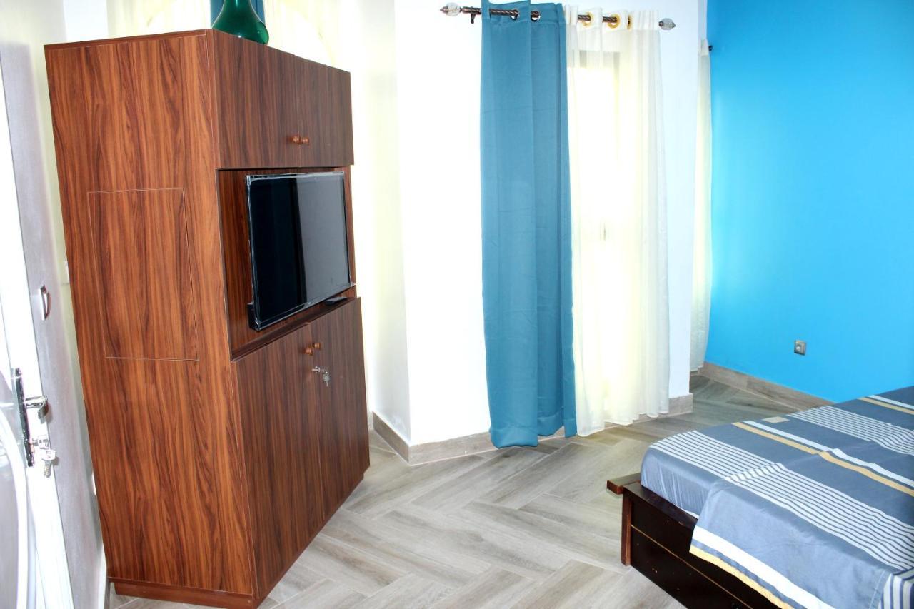Residence Palais Du Stade Cotonou Bagian luar foto