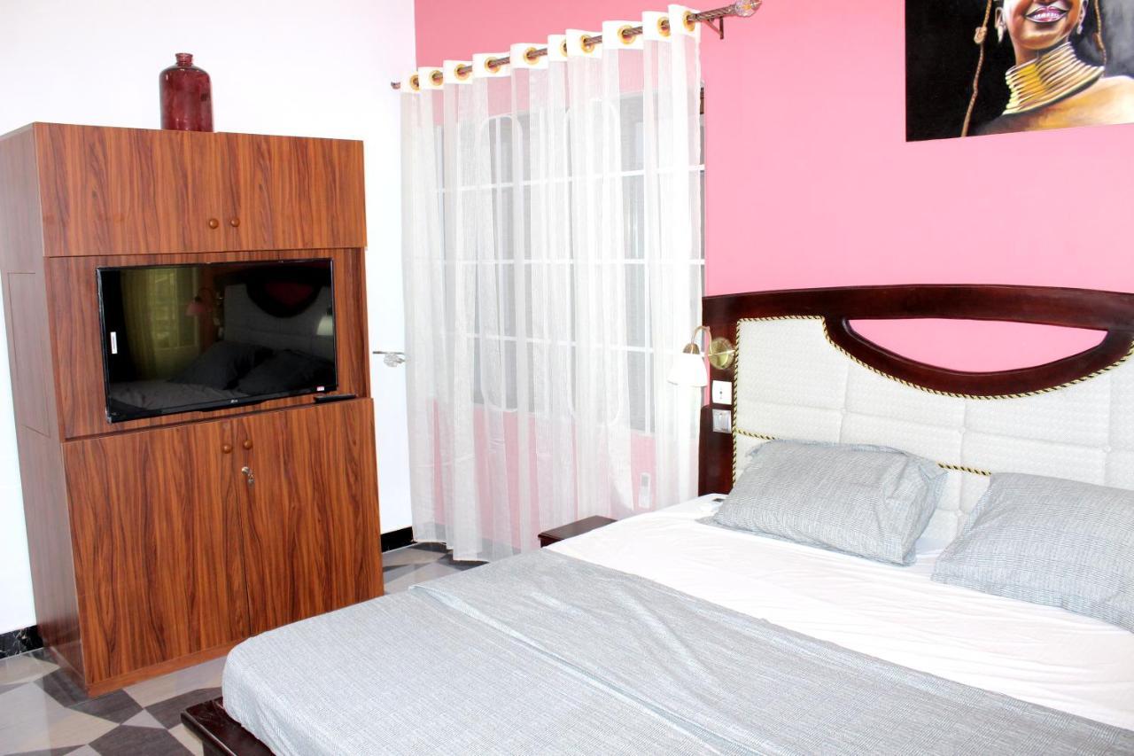 Residence Palais Du Stade Cotonou Bagian luar foto