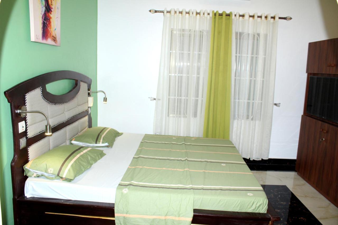 Residence Palais Du Stade Cotonou Bagian luar foto