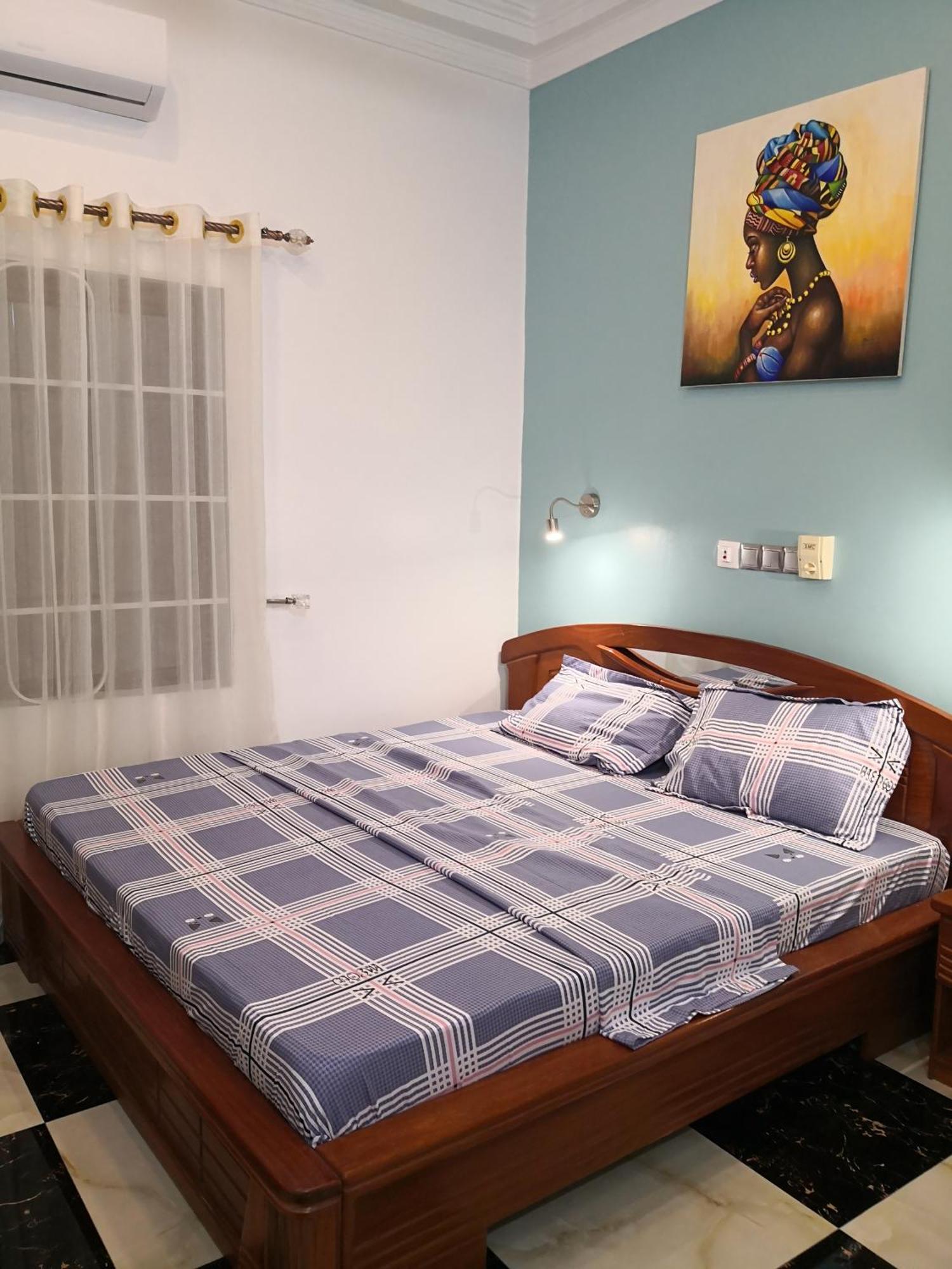 Residence Palais Du Stade Cotonou Ruang foto
